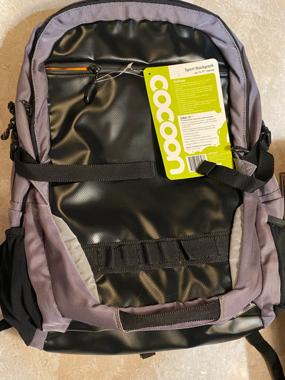 Cocoon Gray and Black Backpack with Orange Zip Accent